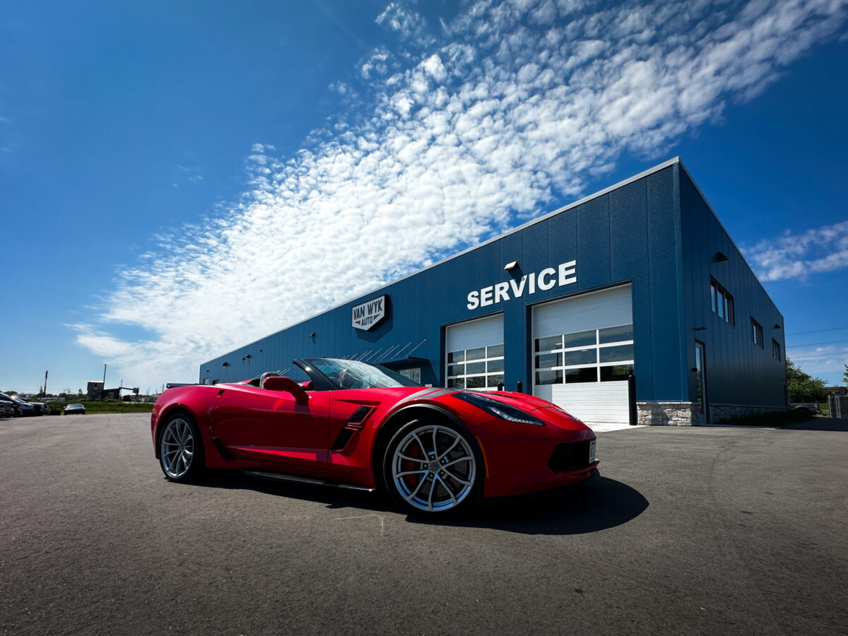 Corvette sports car parked in front of the Van Wyk Auto service center in Sheboygan, Wisconsin.
